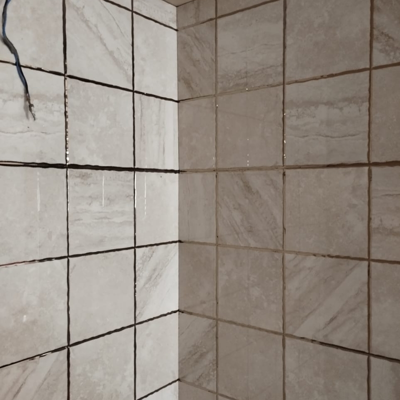 Bathroom tile fitting