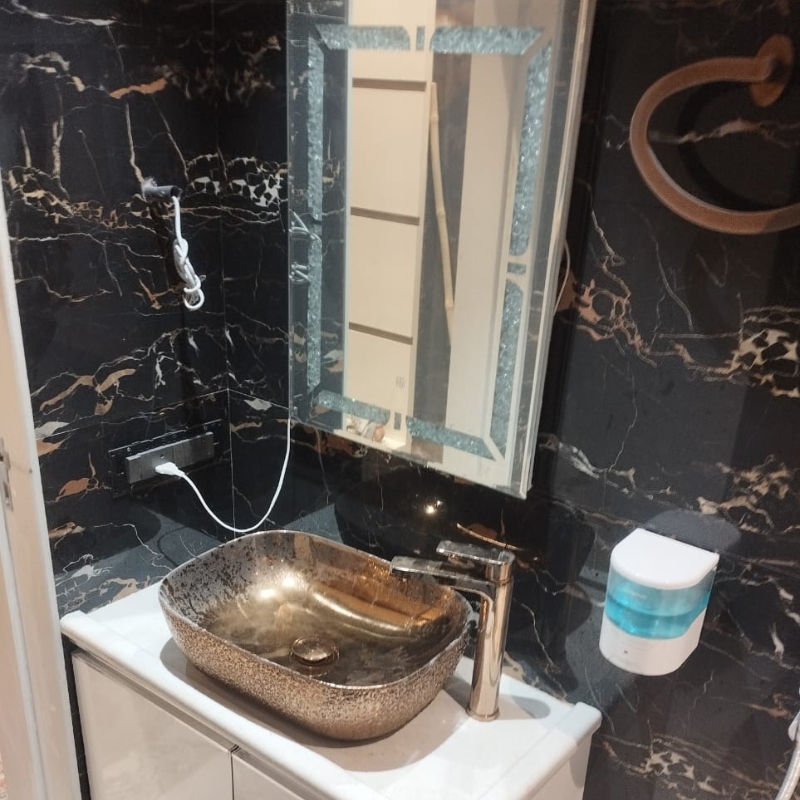 Bathroom tile fitting